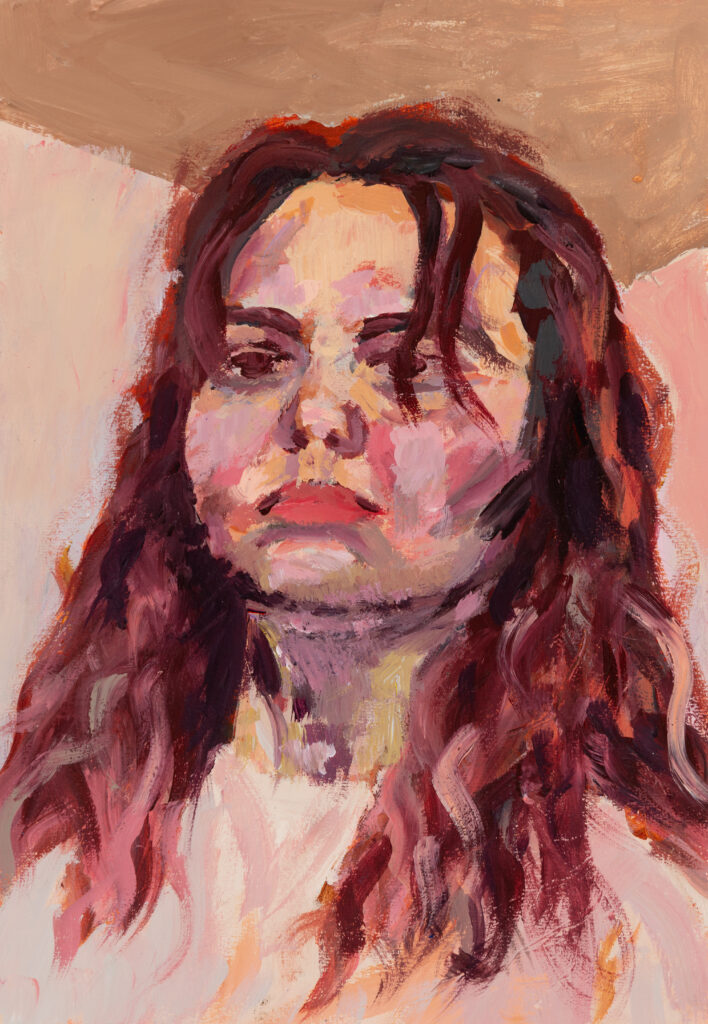 portrait with pink accents of a young woman