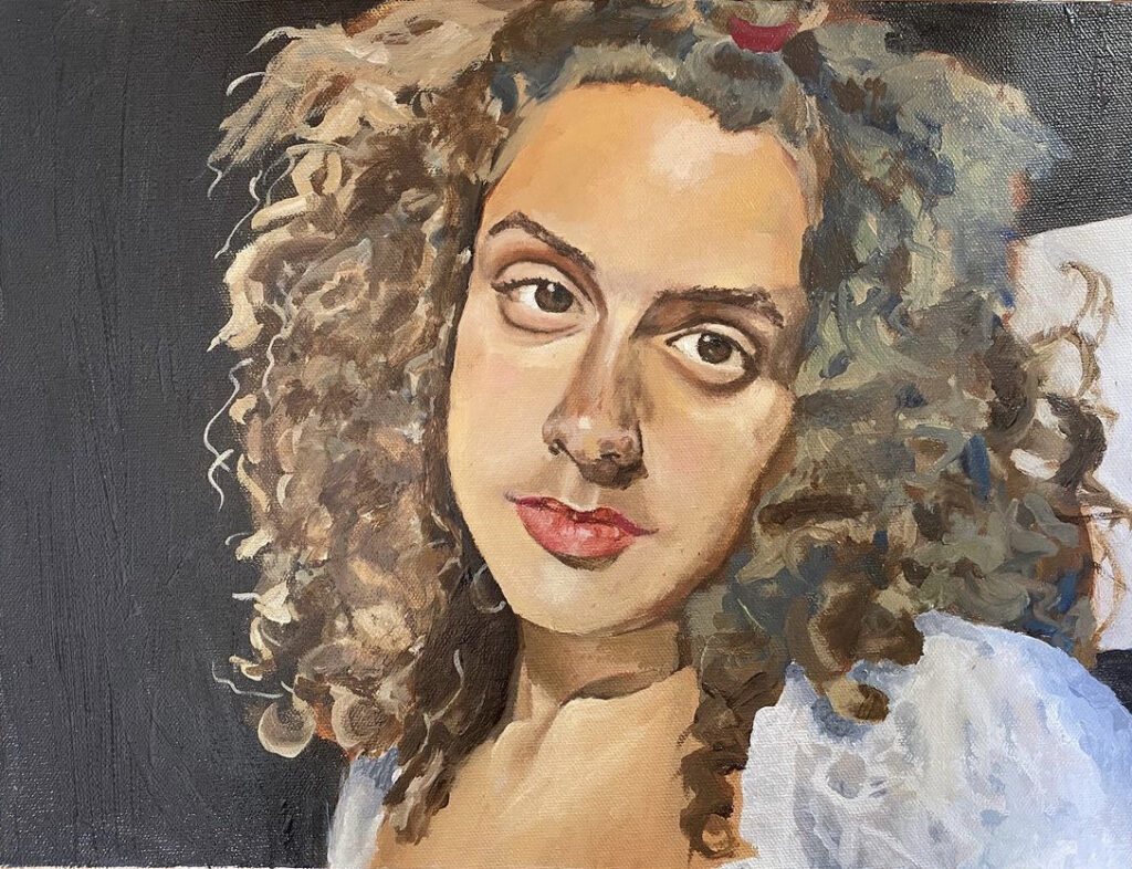 oil portrait of a young brunette woman with curly hair